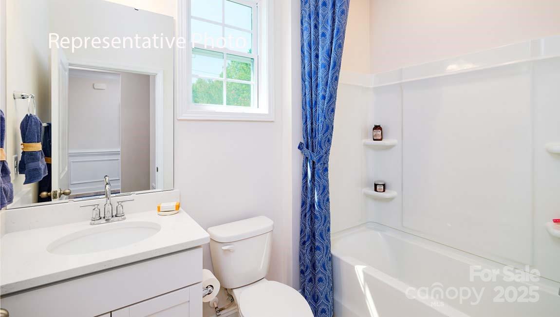 7641 Bainbridge Road Sherrills Ford, NC 28673 - Photo 24 of 29 a bathroom with a sink toilet and shower