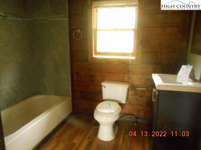 250 Hicks Grv Rd Extension Mooresboro, NC 28114 - Photo 16 of 28 a bathroom with a toilet and a bathtub