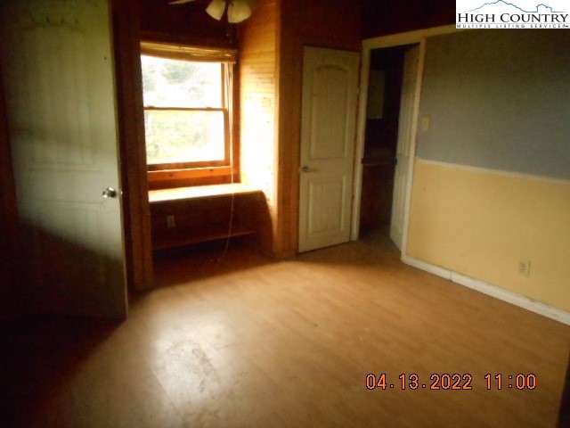 250 Hicks Grv Rd Extension Mooresboro, NC 28114 - Photo 5 of 28 a view of livingroom with an empty space and a window