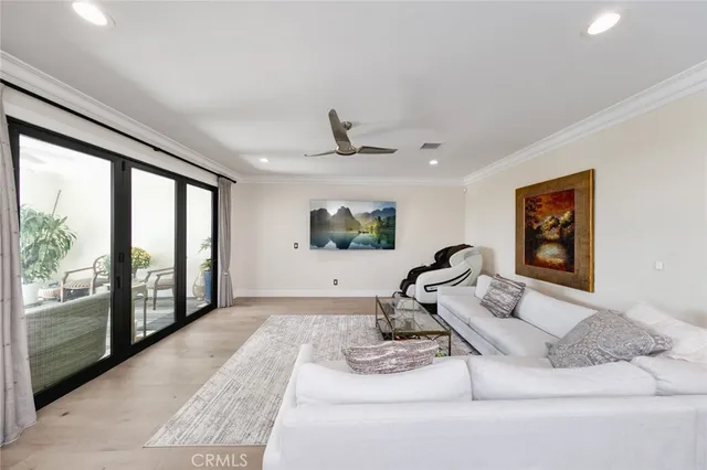 a spacious bedroom with a large bed and a table