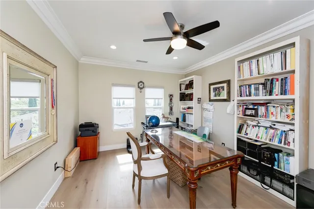 a view of a patio with a table chairs and a backyard