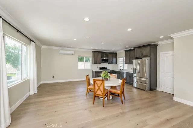 a view of a house with a swimming pool and a yard