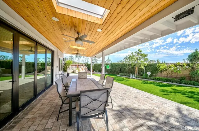 an aerial view of a house with garden space seating area and hardwood street