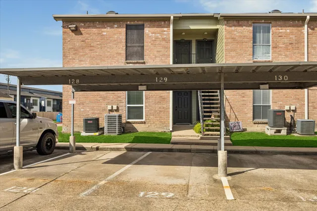 a car parked in front of a house