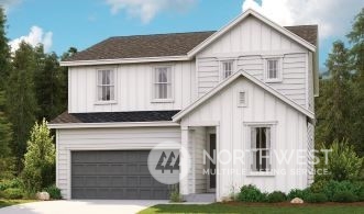 6460 Skipper Lane Southeast, Unit 63 Port Orchard, WA 98367 - Photo 1 of 8 a view of house with garden