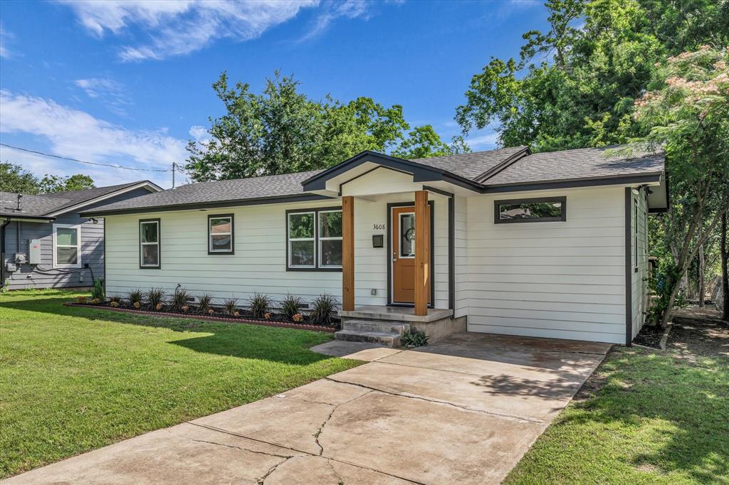 3608 North 26th Street Waco, TX 76708 - Photo 3 of 28 a front view of a house with a garden