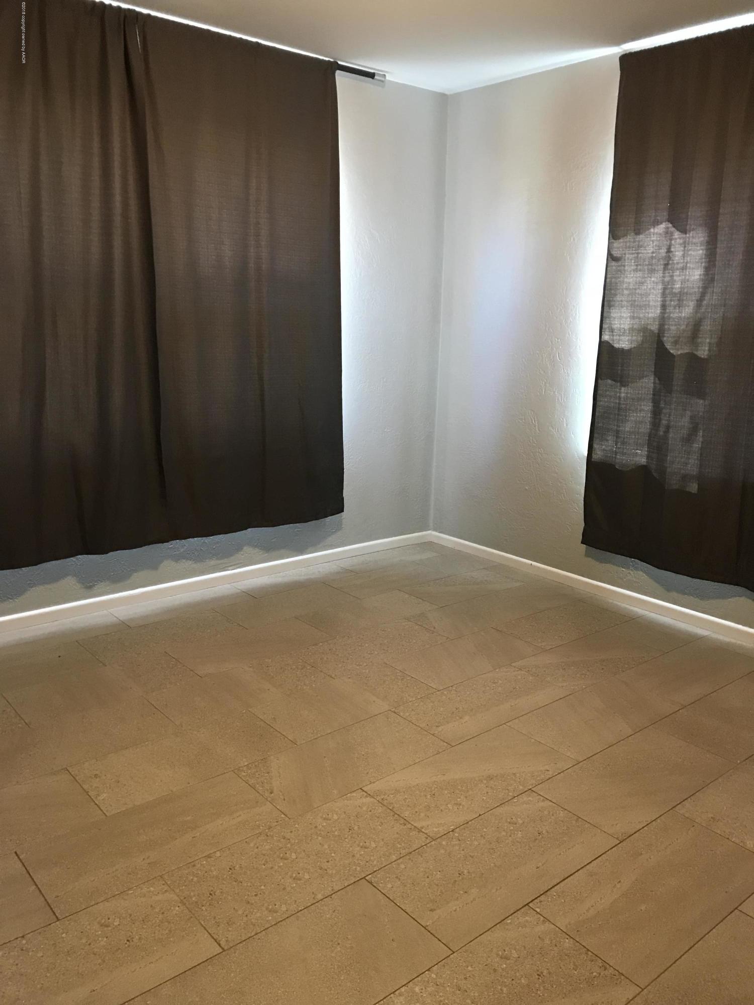 4632 Cline Road Amarillo, TX 79110 - Photo 7 of 27 a view of an empty room
