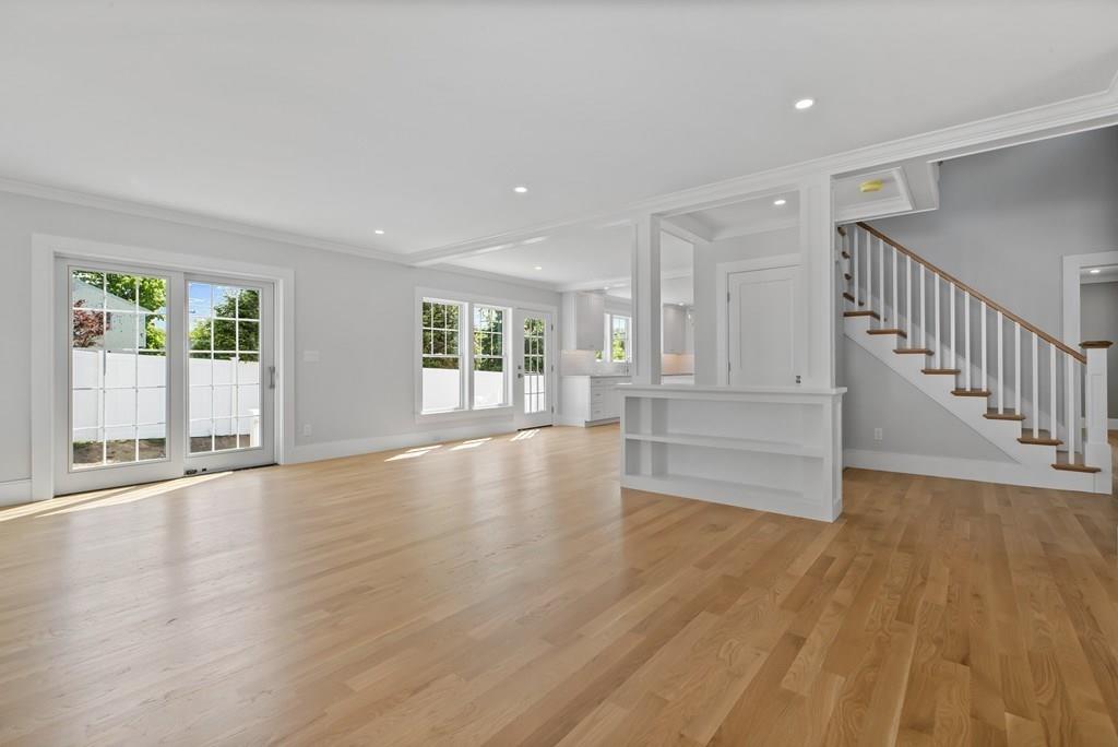 36 Bulow Road Hingham, MA 02043 - Photo 17 of 40 a view of an empty room with wooden floor and a window