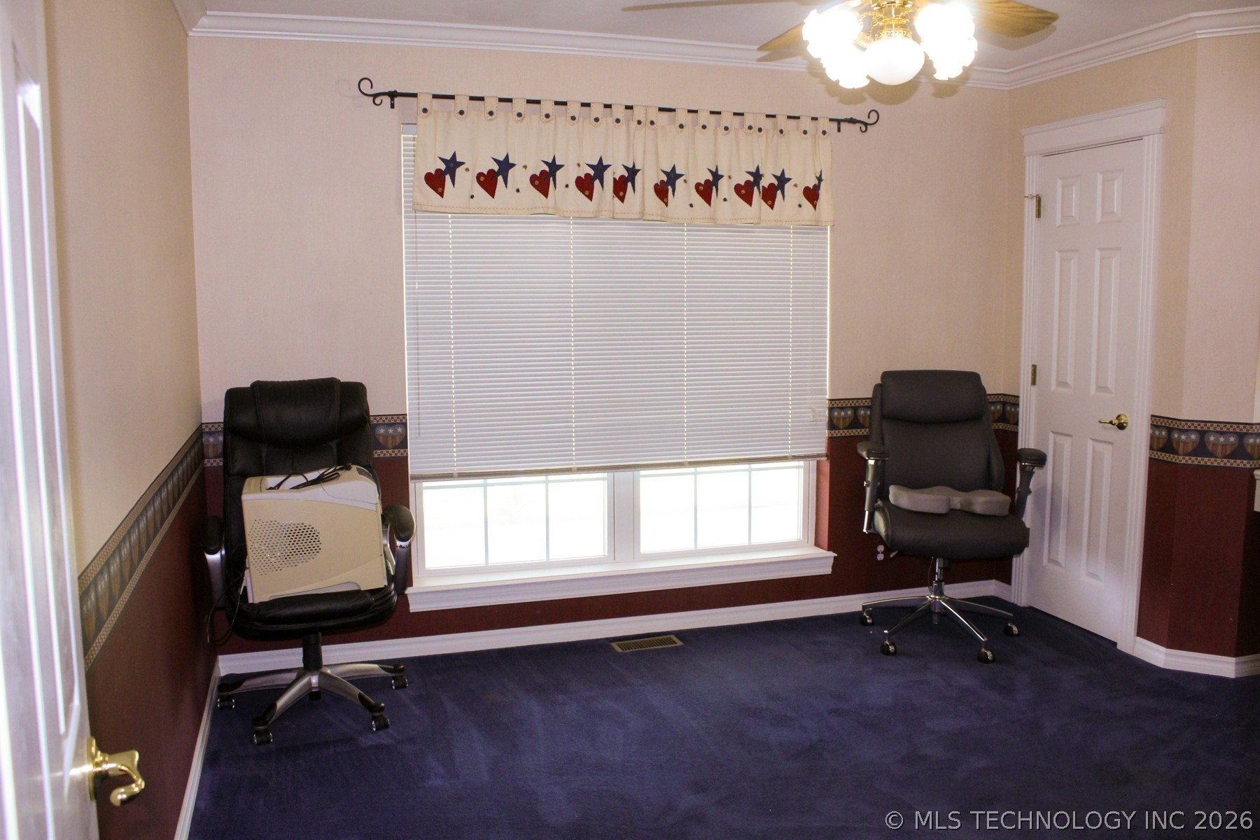 13248 North 3540th Road Maud, OK 74854 - Photo 57 of 98 Room featuring a pair of windows with blinds, crown molding, and a ceiling fan with light fixture