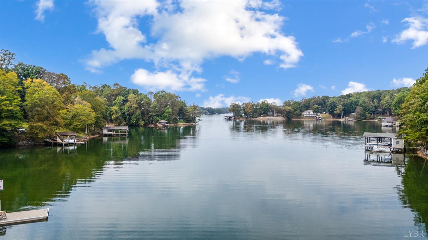 101 Little Creek Road Moneta, VA 24121 - Photo 22 of 76 a view of residential house with outdoor space and lake