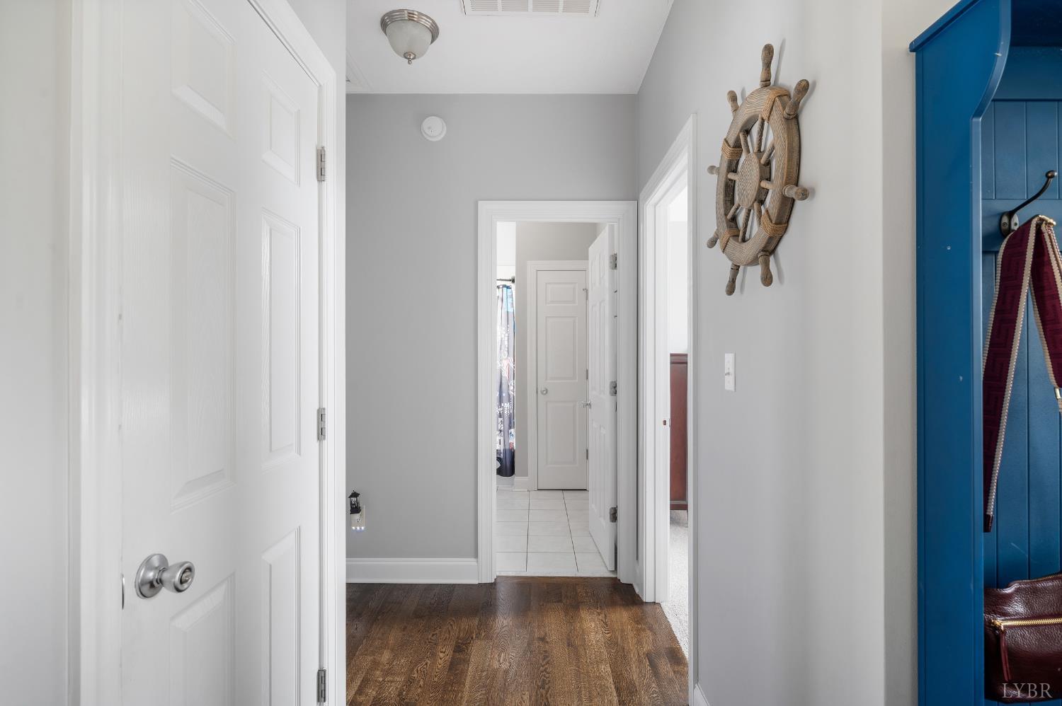 101 Little Creek Road Moneta, VA 24121 - Photo 37 of 76 a view of a hallway with wooden floor and closet