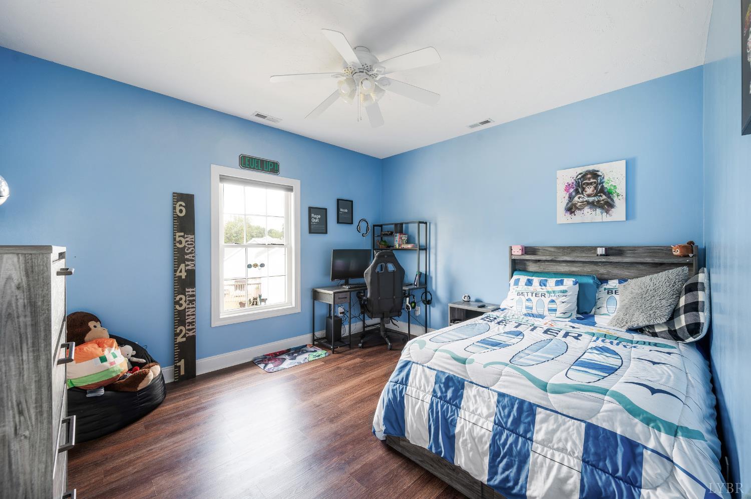 101 Little Creek Road Moneta, VA 24121 - Photo 41 of 76 a bed room with a bed and a tv