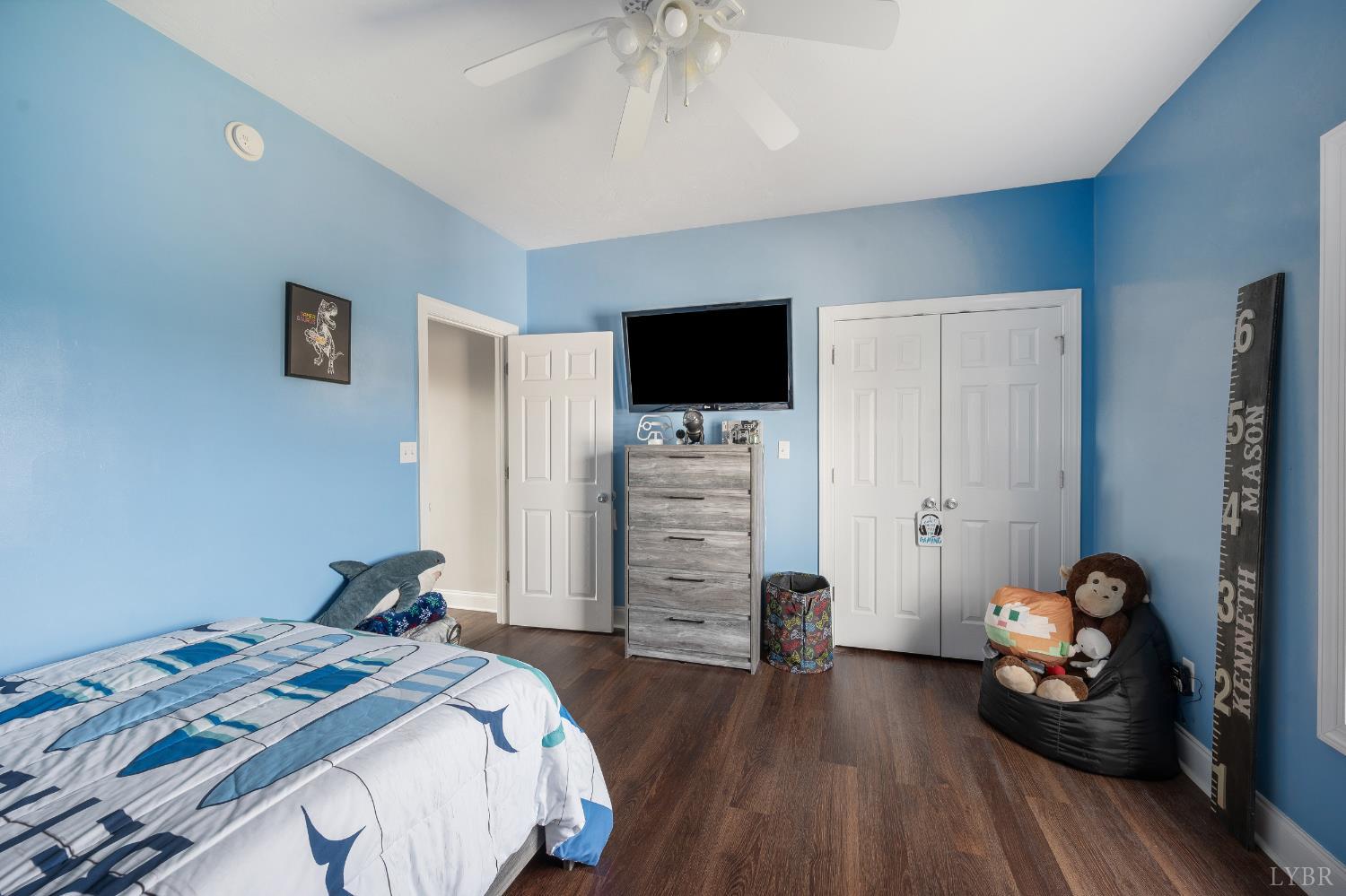 101 Little Creek Road Moneta, VA 24121 - Photo 42 of 76 a bedroom with a bed and wooden floor