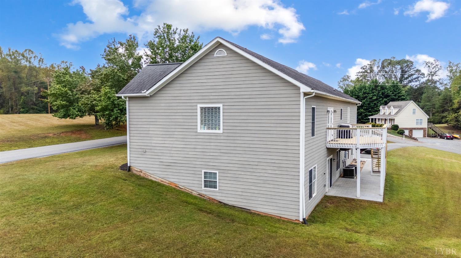 101 Little Creek Road Moneta, VA 24121 - Photo 5 of 76 a view of a house with a backyard