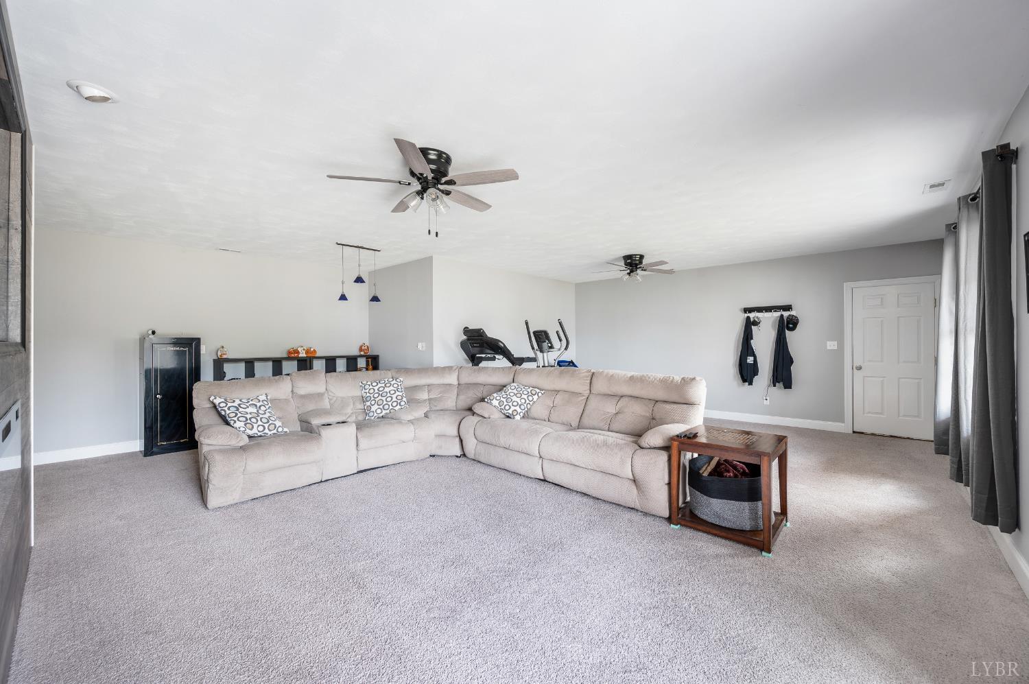 101 Little Creek Road Moneta, VA 24121 - Photo 68 of 76 a living room with furniture and a ceiling fan