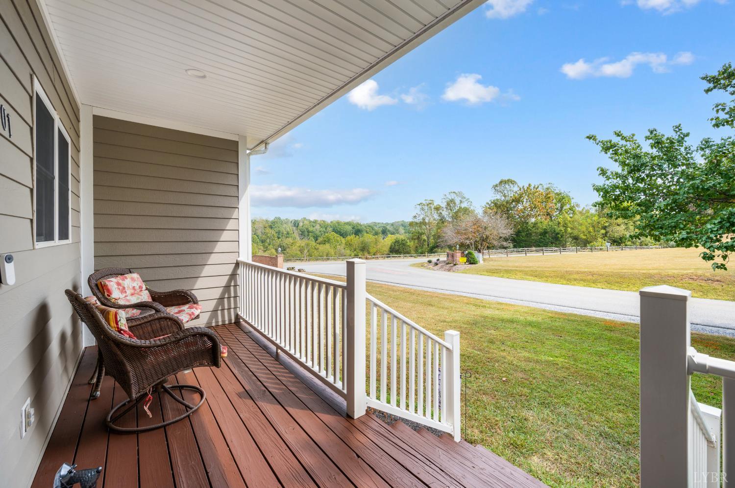 101 Little Creek Road Moneta, VA 24121 - Photo 70 of 76 a view of balcony with wooden floor and seating space