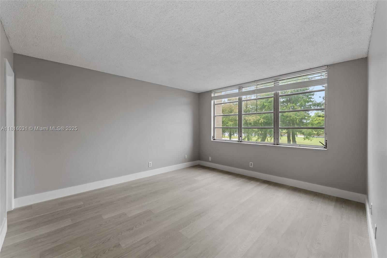 3150 West Rolling Hills Circle, Unit 209 Davie, FL 33328 - Photo 11 of 18 Primary Bedroom