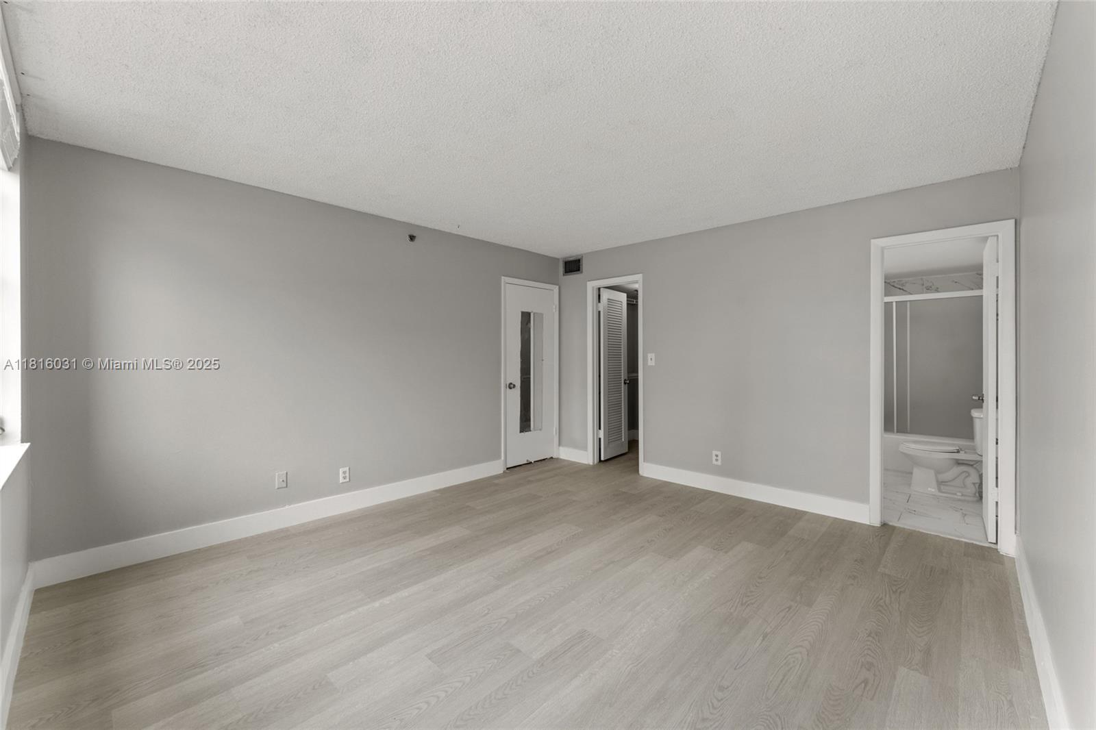 3150 West Rolling Hills Circle, Unit 209 Davie, FL 33328 - Photo 12 of 18 Primary Bedroom