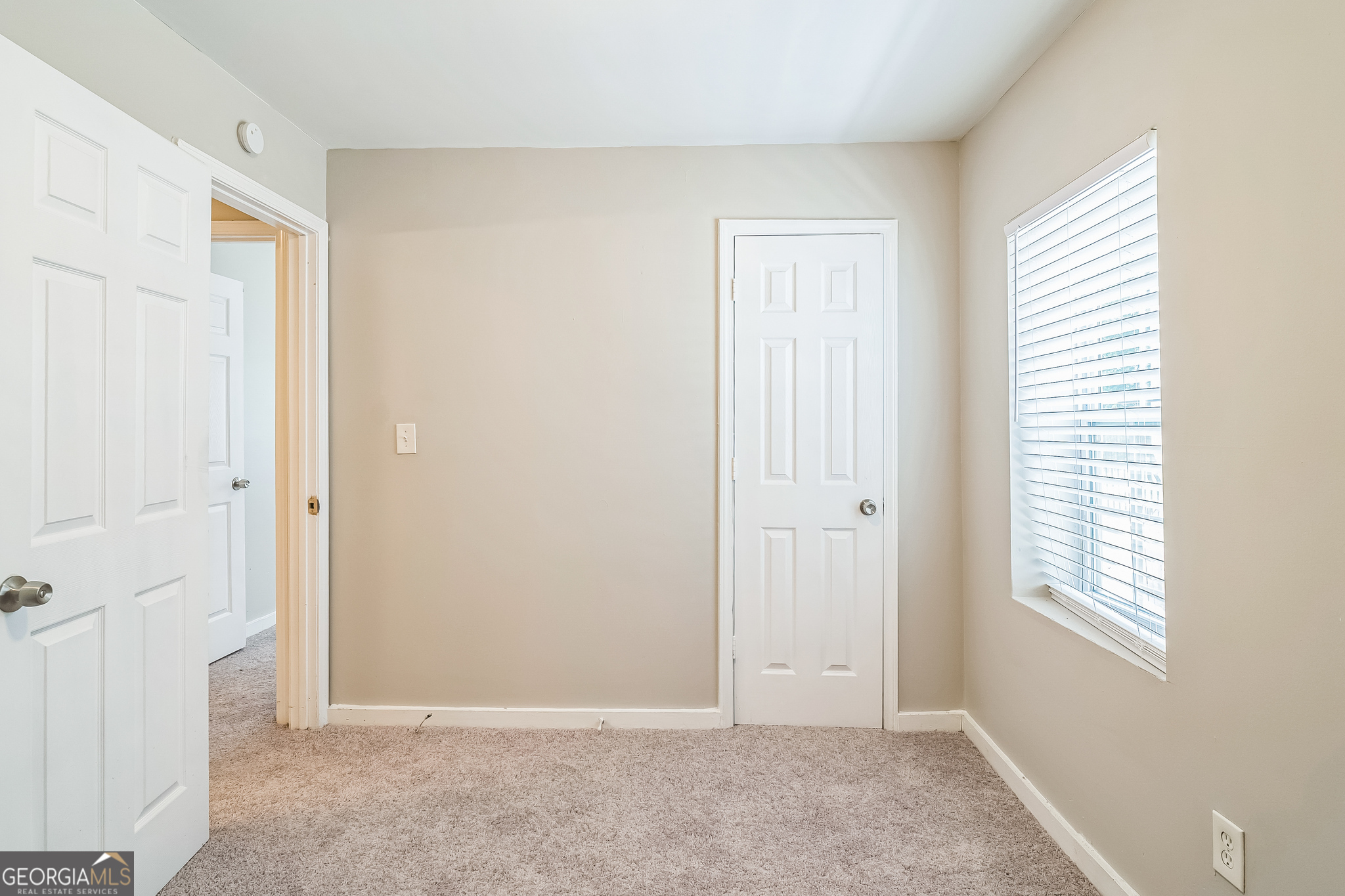 1381 Sharon Street Northwest Atlanta, GA 30314 - Photo 22 of 34 a view of an empty room with windows