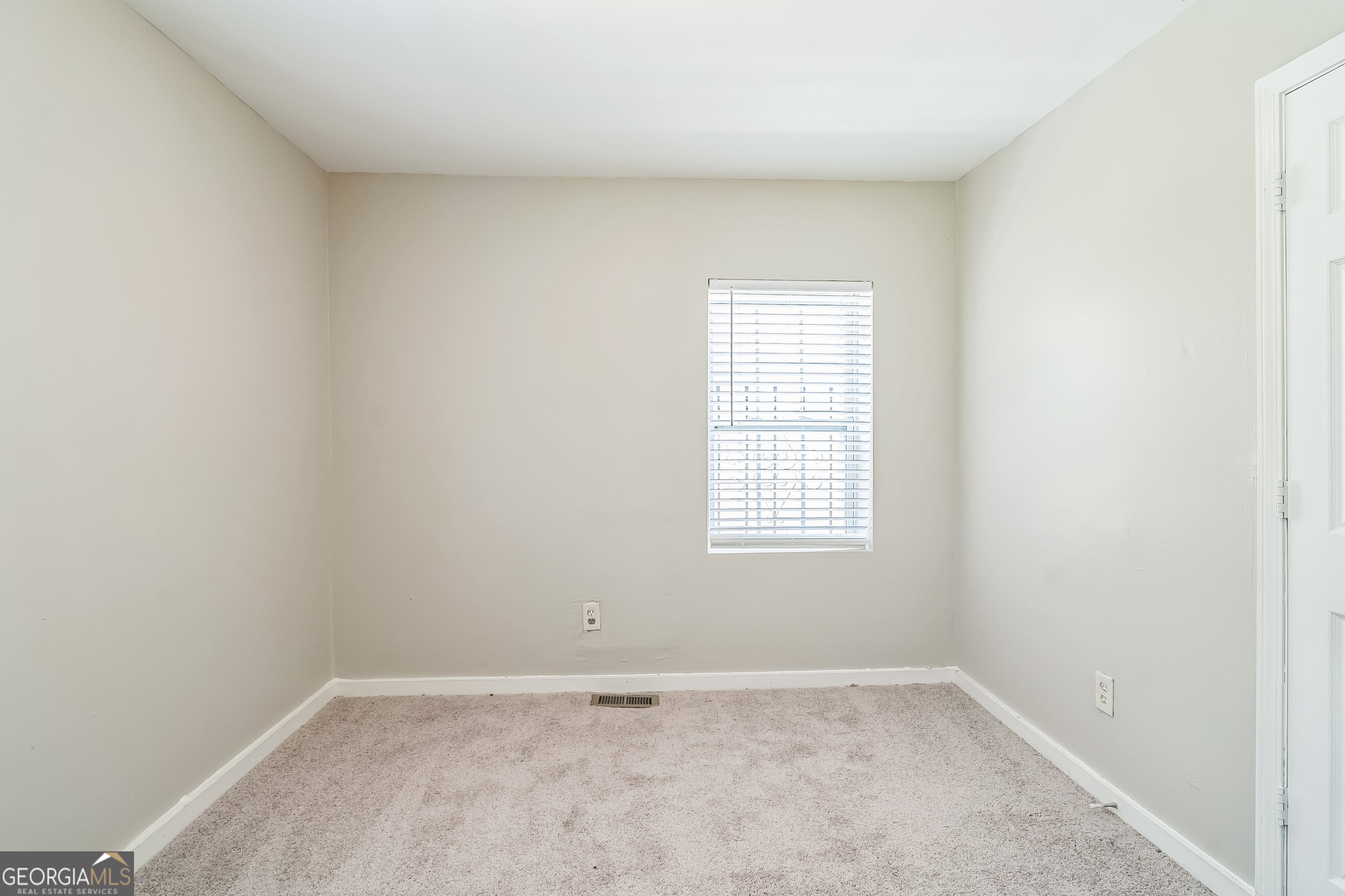 1381 Sharon Street Northwest Atlanta, GA 30314 - Photo 26 of 34 an empty room with a window