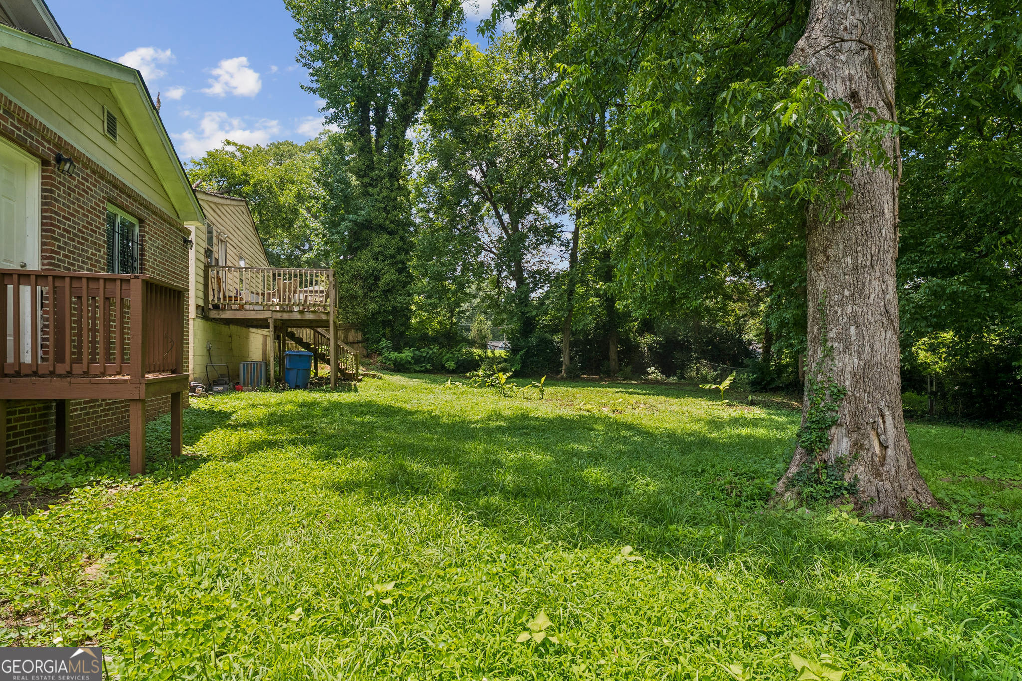 1381 Sharon Street Northwest Atlanta, GA 30314 - Photo 30 of 34 a view of backyard with swimming pool and green space