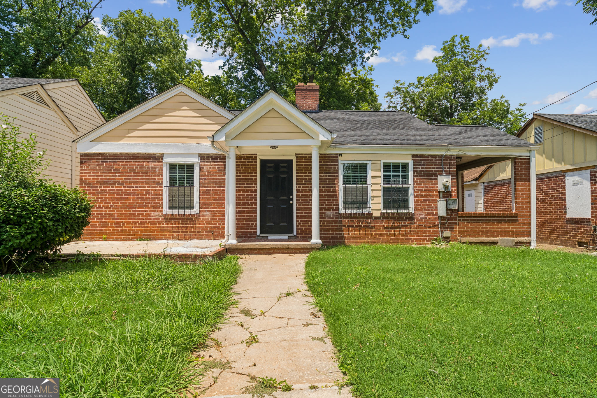 1381 Sharon Street Northwest Atlanta, GA 30314 - Photo 3 of 34 a view of a house with a yard