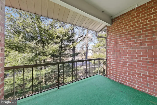 a view of a yard from a balcony