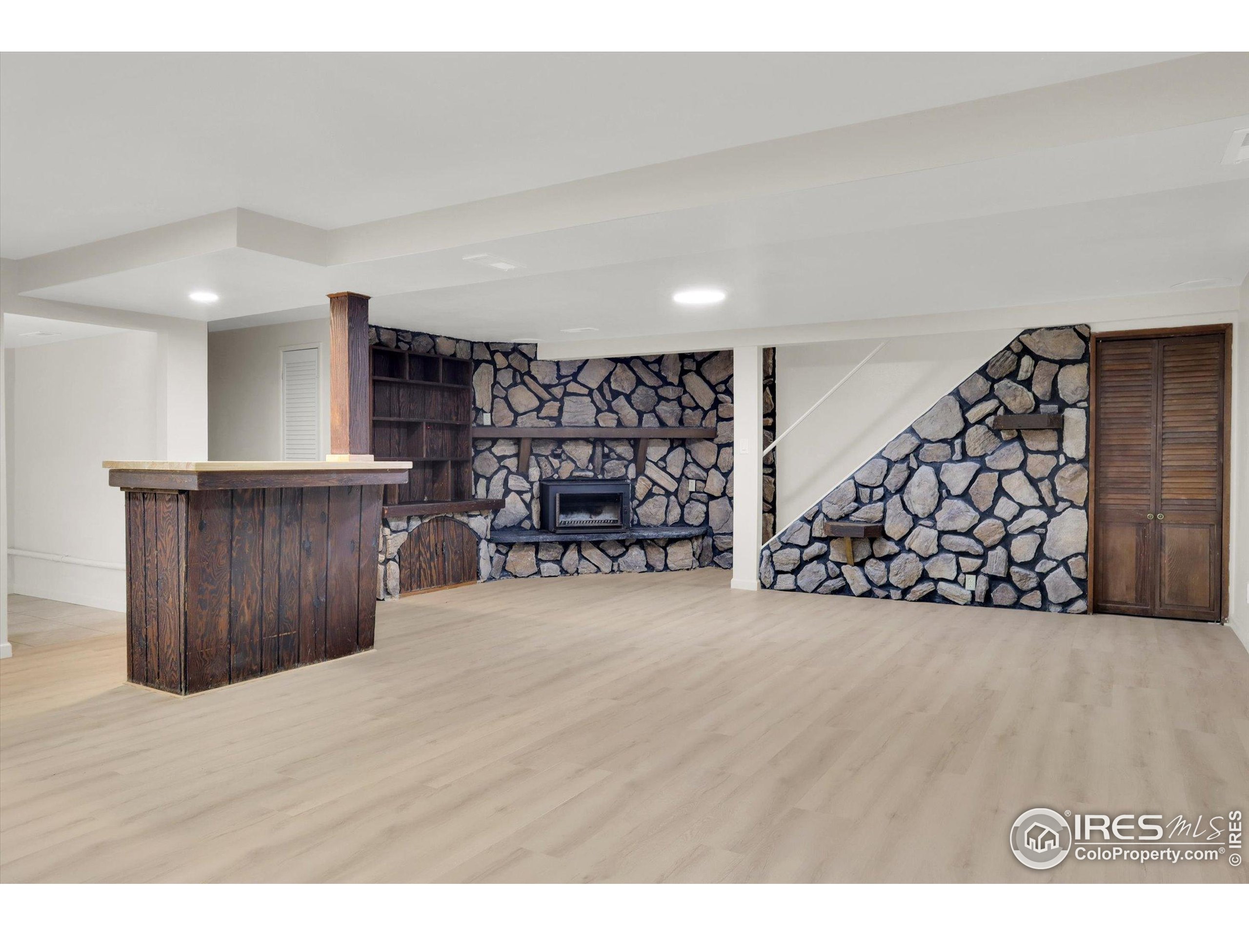 4630 Macky Way Boulder, CO 80305 - Photo 22 of 40 a view of an empty room with wooden wall