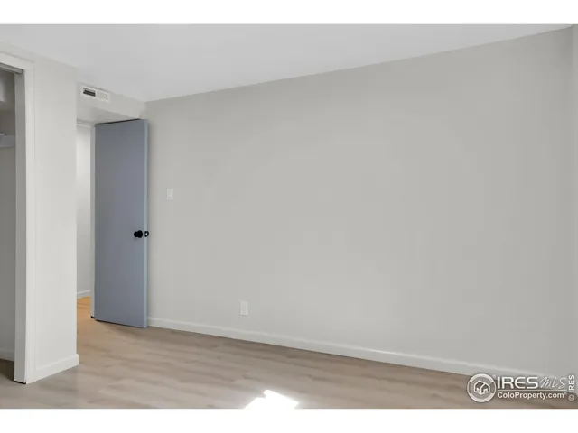 a bathroom with a sink vanity and mirror