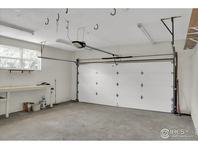 a view of a house with backyard and deck