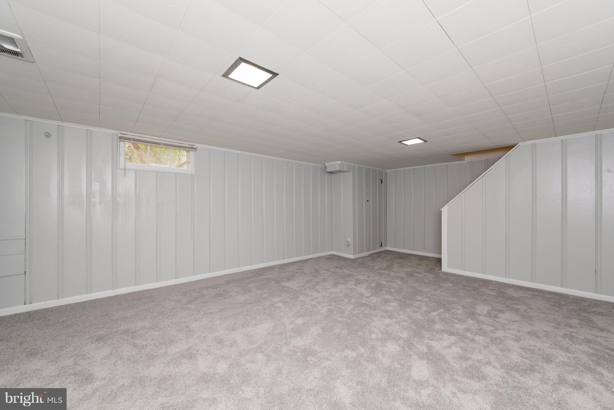 1906 Glen Ridge Road Towson, MD 21286 - Photo 24 of 30 a view of an empty room with a window