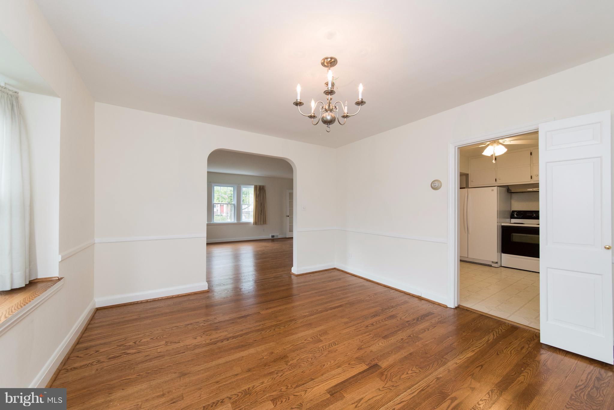 1906 Glen Ridge Road Towson, MD 21286 - Photo 6 of 30 wooden floor in an empty room with a window