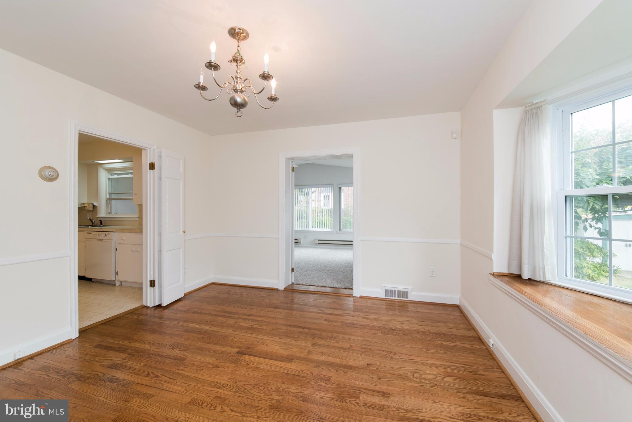 1906 Glen Ridge Road Towson, MD 21286 - Photo 7 of 30 wooden floor in an empty room with a window