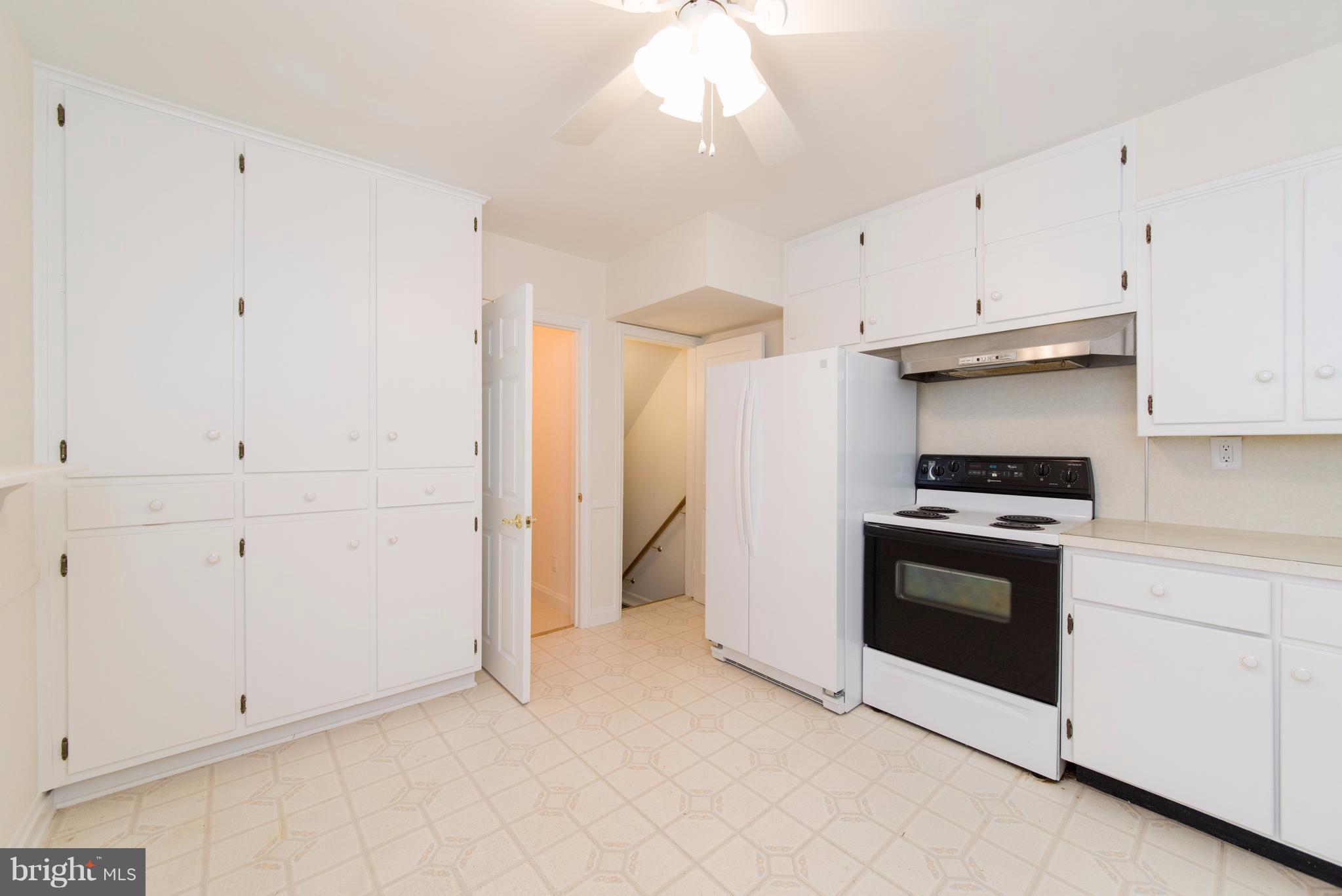 1906 Glen Ridge Road Towson, MD 21286 - Photo 9 of 30 a kitchen with cabinets and steel stainless steel appliances