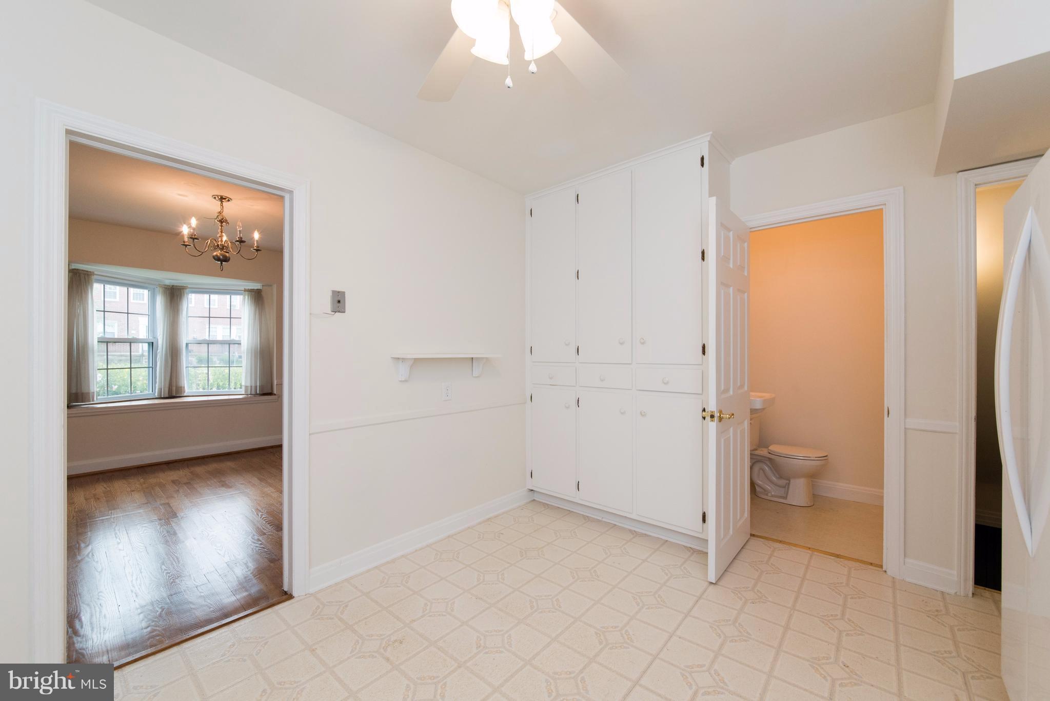 1906 Glen Ridge Road Towson, MD 21286 - Photo 10 of 30 a view of bathroom with a toilet sink and a mirror