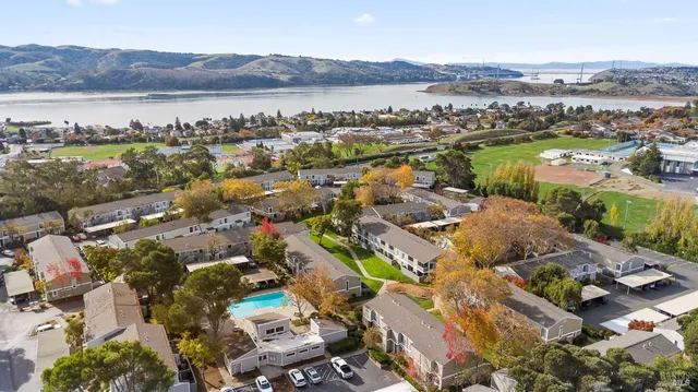 an aerial view of a city with lots of residential buildings