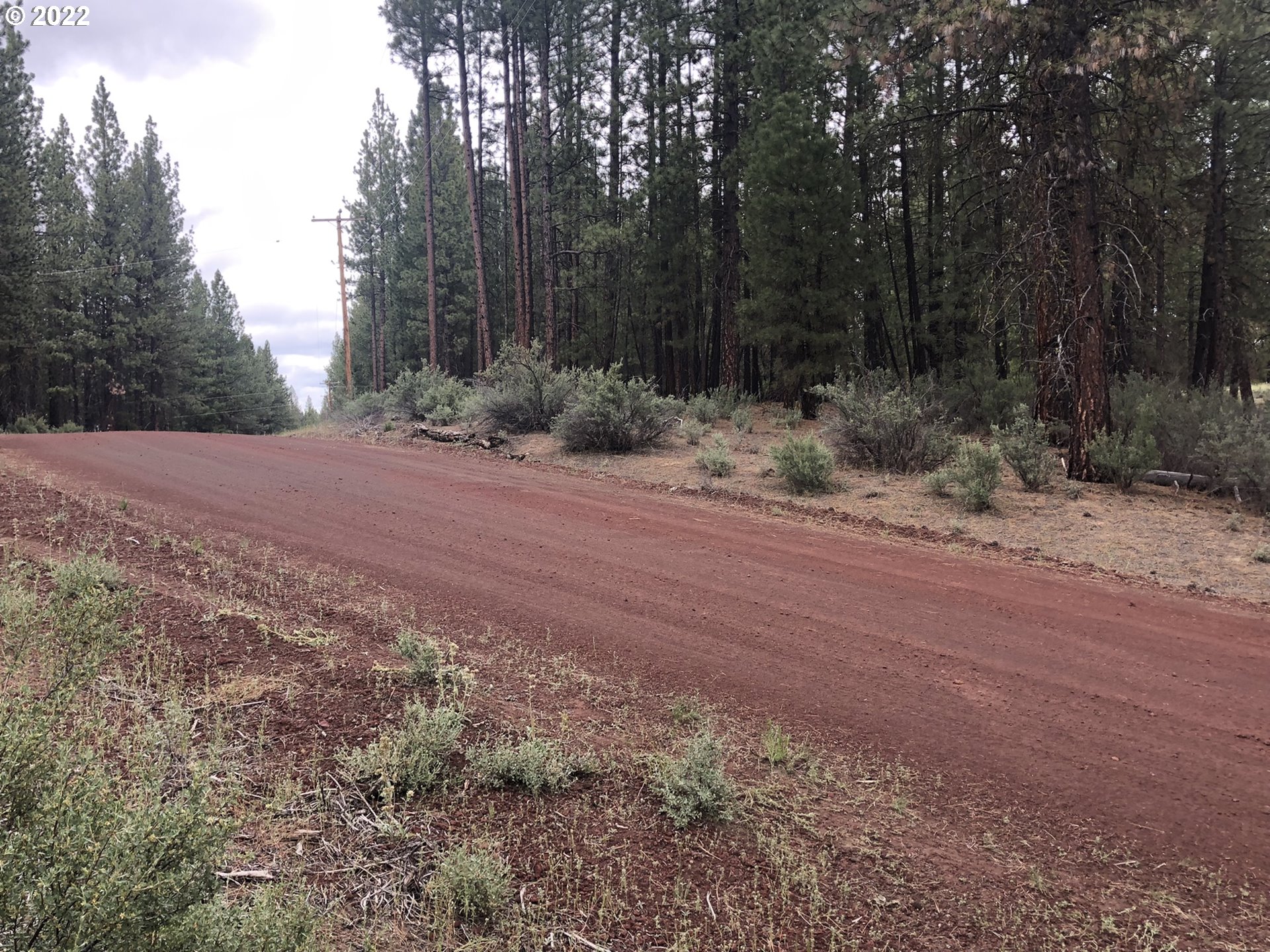 Corbell Drive, Unit 400 Chiloquin, OR 97624 - Photo 6 of 10 a backyard of a house with lots of green space