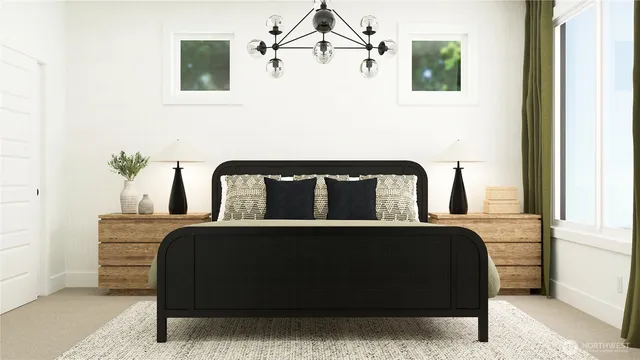 a bedroom with a bed a mirror and a potted plant