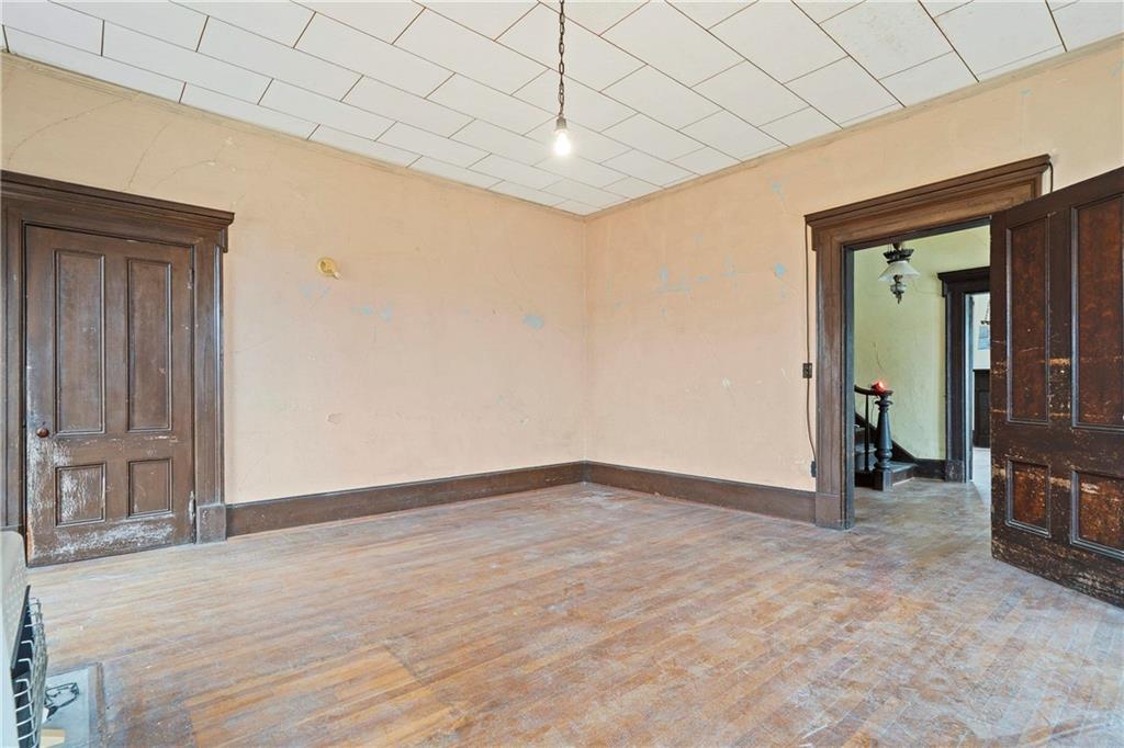 12871 Linton Road Sparta, GA 31087 - Photo 41 of 56 a view of empty room with wooden floor