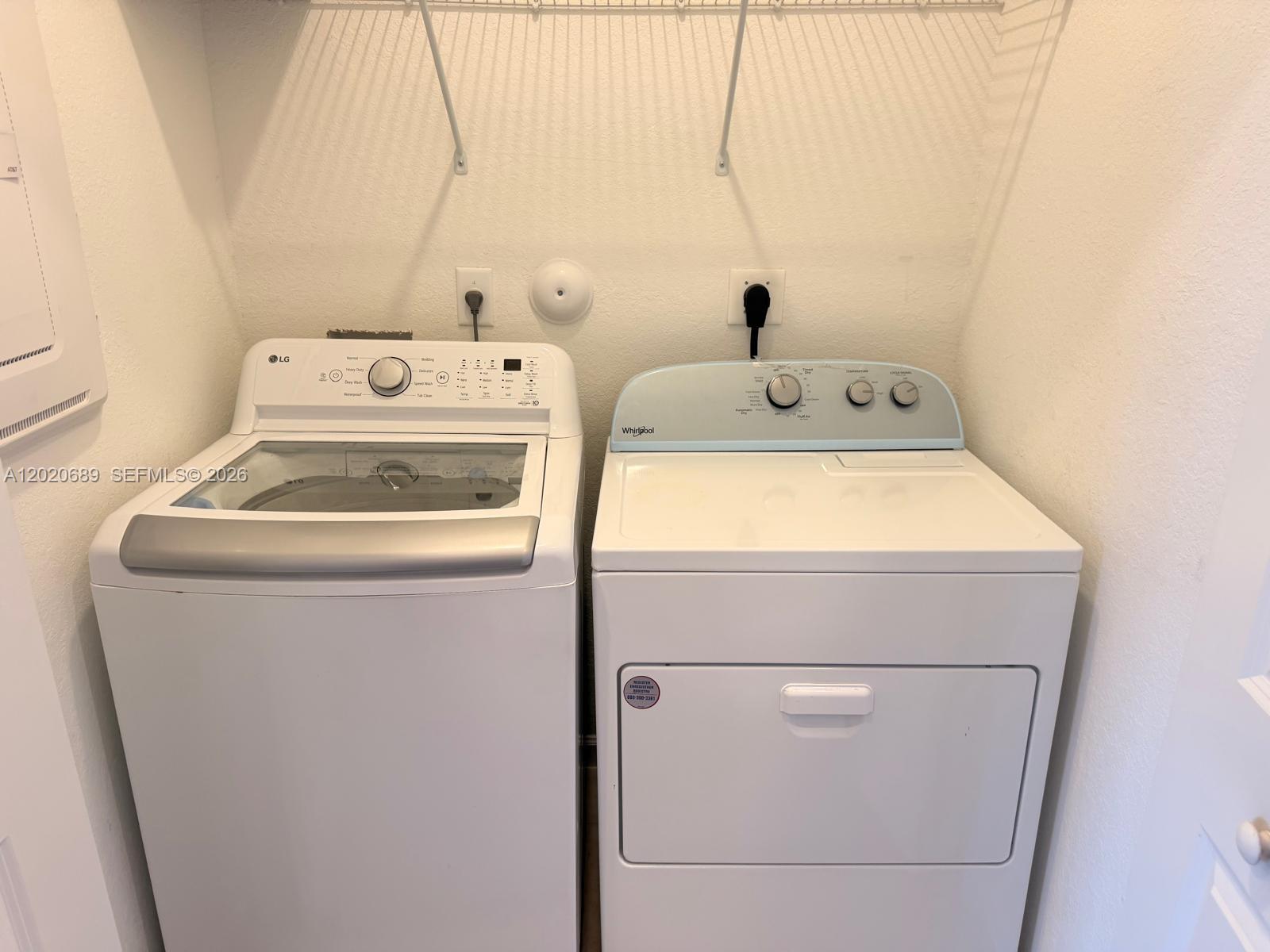 12875 Southwest 231st Terrace Miami, FL 33170 - Photo 24 of 25 a utility room with dryer and washer