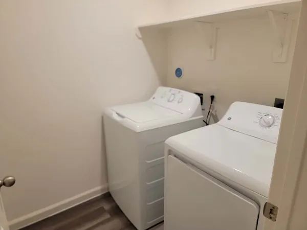 a utility room with dryer and washer