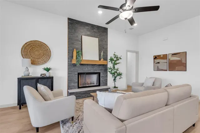 a view of a dining room with furniture and window