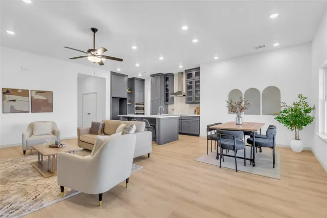 a bedroom with a bed couch and window