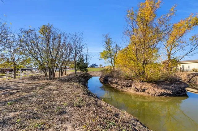 a view of an ocean and city