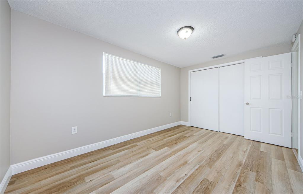 7715 Rottingham Road Port Richey, FL 34668 - Photo 19 of 32 Bedroom 1