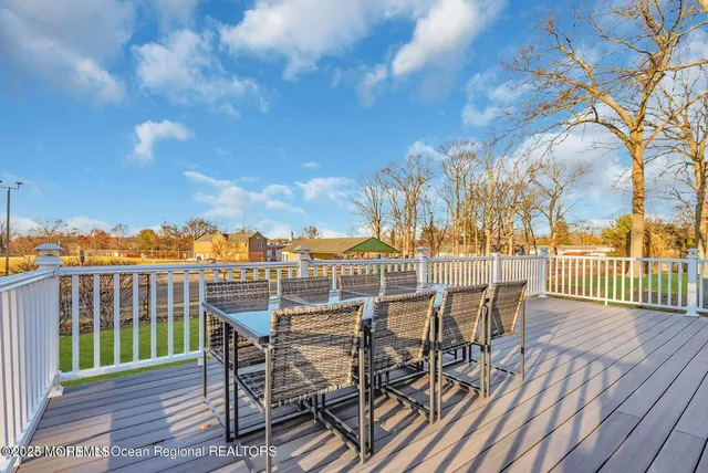 a view of a balcony with chairs