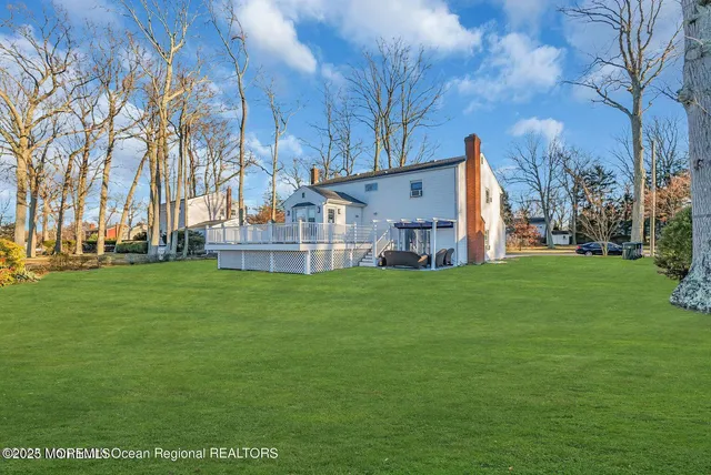a view of a house with a big yard