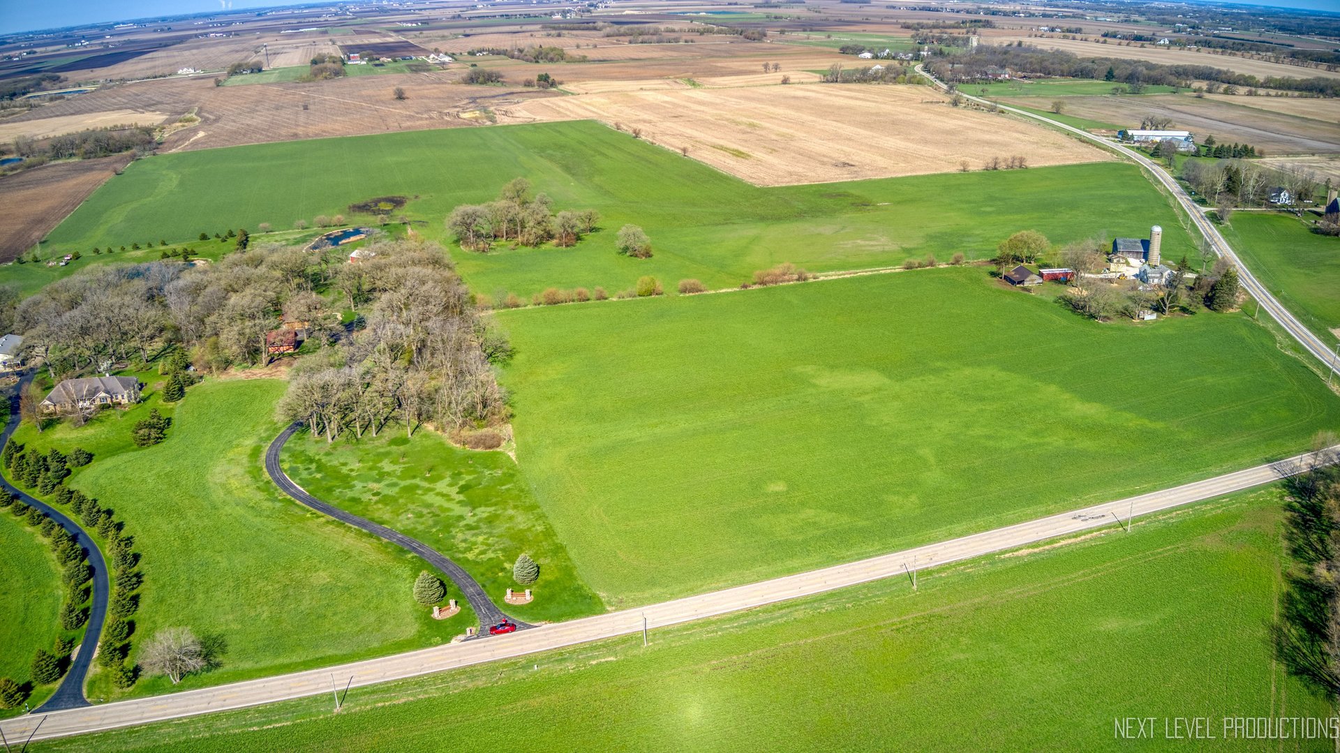 46W109 Big Timber Road Hampshire, IL 60140 - Photo 10 of 11 a view of a field with an ocean