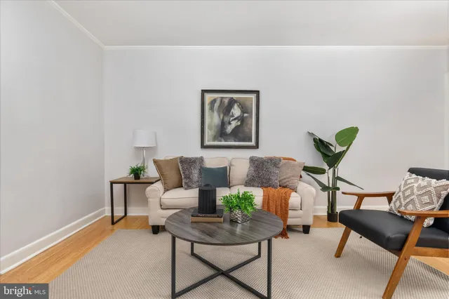 front view of brick house with a small yard