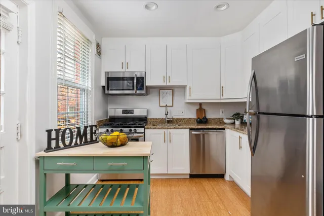 a front view of a house with a deck